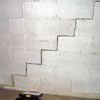 A diagonal stair step crack along the foundation wall of a Hammond home
