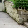 a collapsing retaining wall in Crown Point
