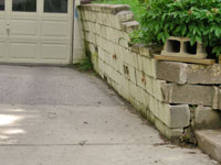 a failing retaining wall around a driveway in Fort Wayne