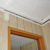 The ceiling and wall separating as the wall sinks with the slab floor in a Hammond home