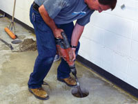 Coring the concrete of a concrete slab floor in Warsaw