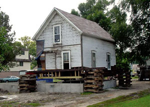 A severely damaged home foundation that is undergoing replacement in Griffith.