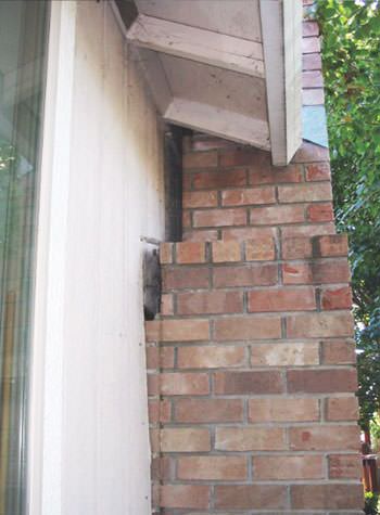sinking, leaning chimneys that are in danger of collapse in Columbia City