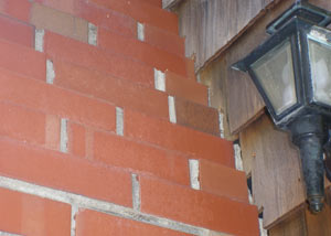 a repaired chimney in Granger that had shown serious foundation damage and was repaired with a helical pier system.