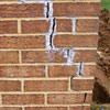 Tuckpointing that cracked due to foundation settlement of a South Bend home