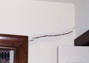 A large drywall crack in an interior wall in Mishawaka
