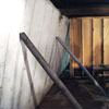 Temporary foundation wall supports stabilizing a Valparaiso home