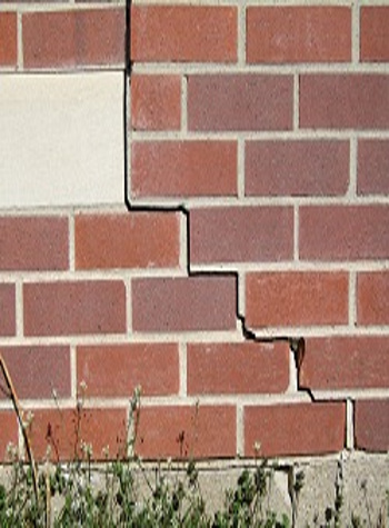 photo of a rotating foundation wall with cracks in Kendallville