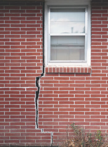 severe foundation wall cracks along a window in Griffith