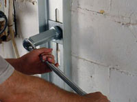 Mounting a foundation wall channel anchor in Goshen.