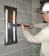 Tightening a wall anchor plate in Valparaiso, Indiana
