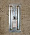 A fully exposed wall anchor plate installed along a Rochester foundation wall