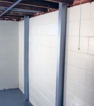 A PowerBrace™ i-beam foundation wall repair system in Fort Wayne