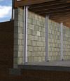 I-beam foundation wall supports installed in a New Haven basement.