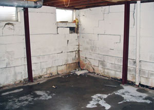 A failed, rusty i-beam foundation wall system installed in Kendallville.