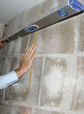 severe foundation wall failure symptoms of a basement wall in Rochester