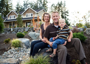 A happy family outside a home with a repaired foundation in Schererville