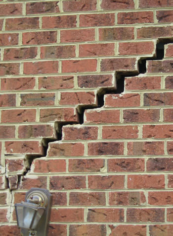 major cracking of a brick foundation wall in Kendallville