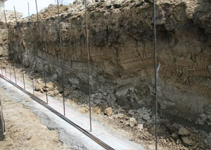 Soil layers exposed while excavating to construct a new foundation in Portage