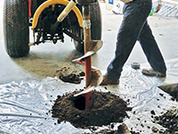 Digging the hole used for wall anchor installation in Munster.